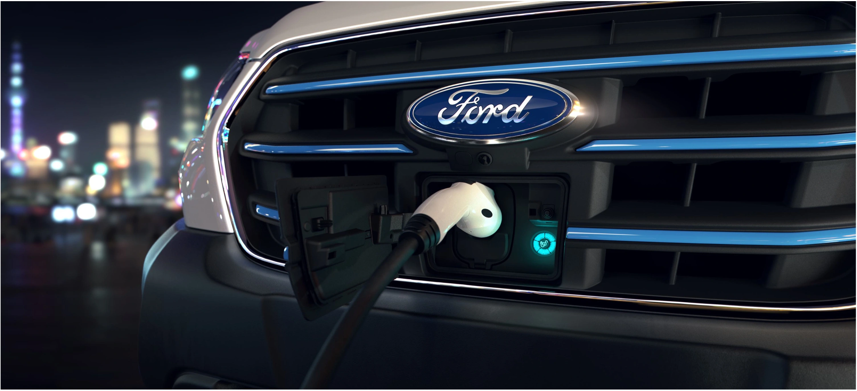 Close up of an eTransit plugged in and charging at night.